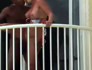 caught an bi-racial duo on the balcony